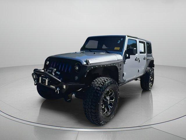 used 2014 Jeep Wrangler Unlimited car, priced at $17,999