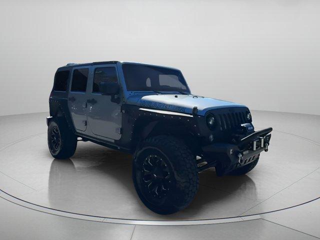 used 2014 Jeep Wrangler Unlimited car, priced at $17,999
