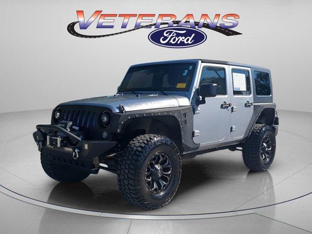 used 2014 Jeep Wrangler Unlimited car, priced at $17,999