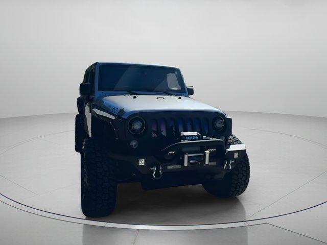 used 2014 Jeep Wrangler Unlimited car, priced at $17,999