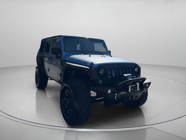 used 2014 Jeep Wrangler Unlimited car, priced at $17,999