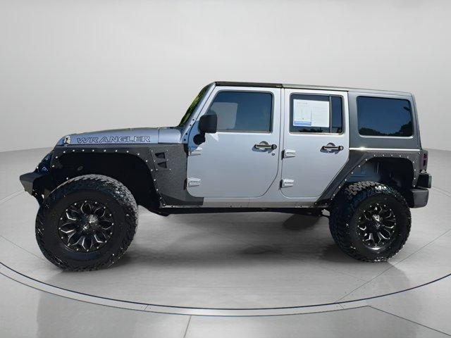 used 2014 Jeep Wrangler Unlimited car, priced at $17,999