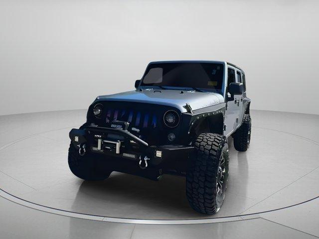 used 2014 Jeep Wrangler Unlimited car, priced at $17,999
