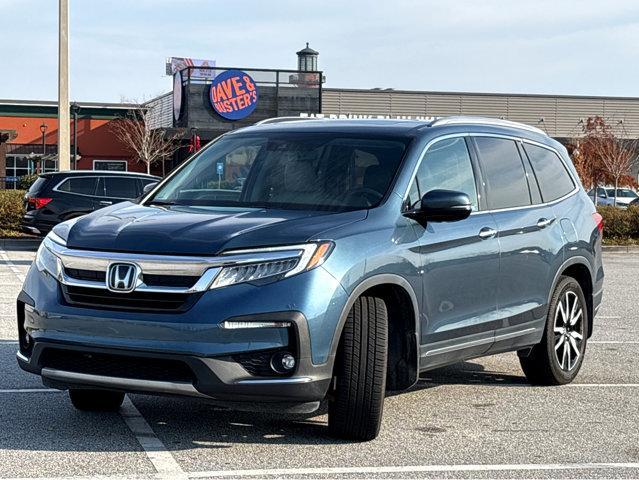 used 2021 Honda Pilot car, priced at $27,986