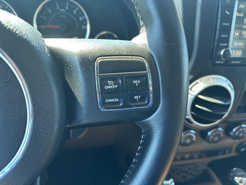 used 2014 Jeep Wrangler Unlimited car, priced at $13,998