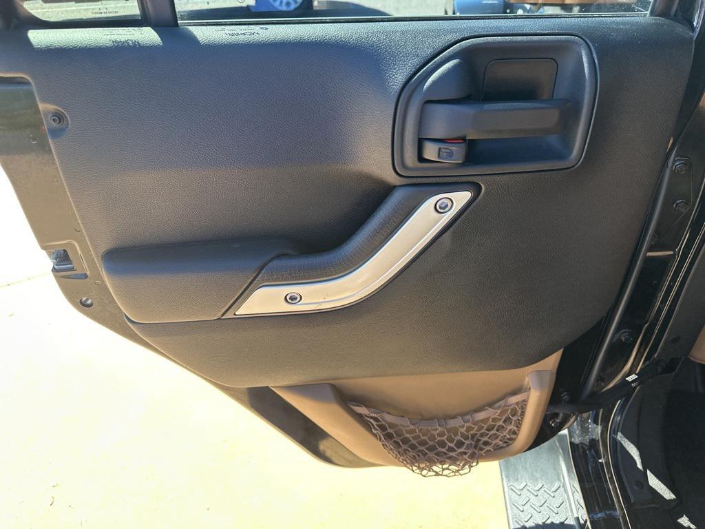 used 2014 Jeep Wrangler Unlimited car, priced at $13,998