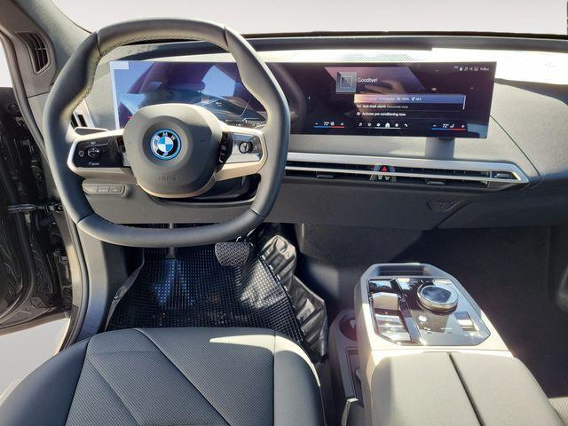 new 2024 BMW iX car, priced at $94,795