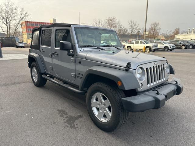 used 2017 Jeep Wrangler Unlimited car, priced at $23,876