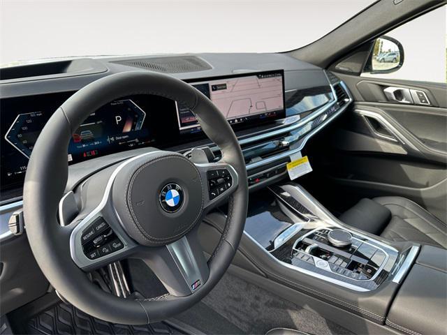 used 2025 BMW X6 car, priced at $79,840