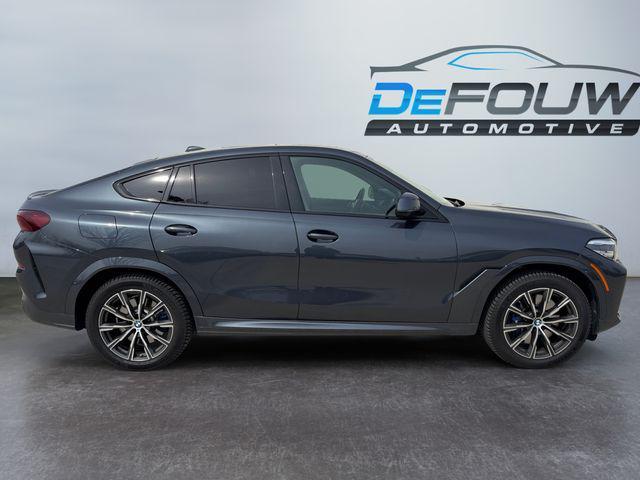 used 2022 BMW X6 car, priced at $56,900