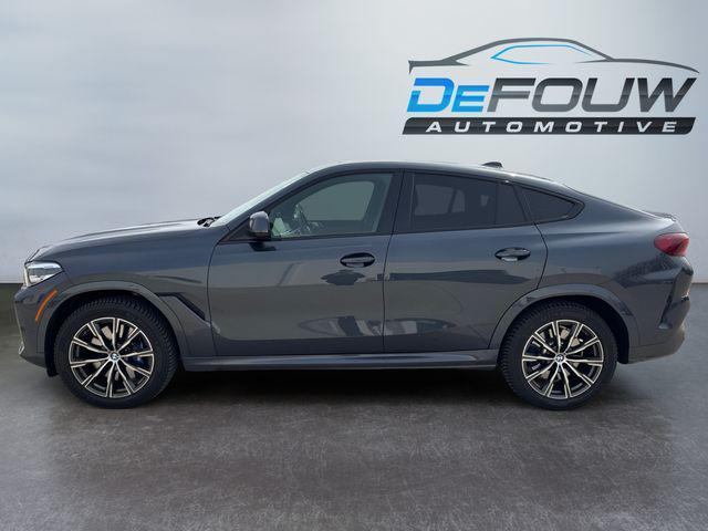 used 2022 BMW X6 car, priced at $56,900