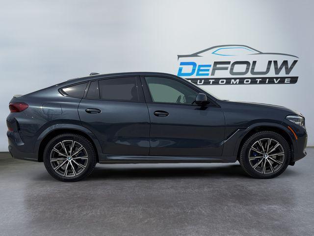 used 2022 BMW X6 car, priced at $56,900