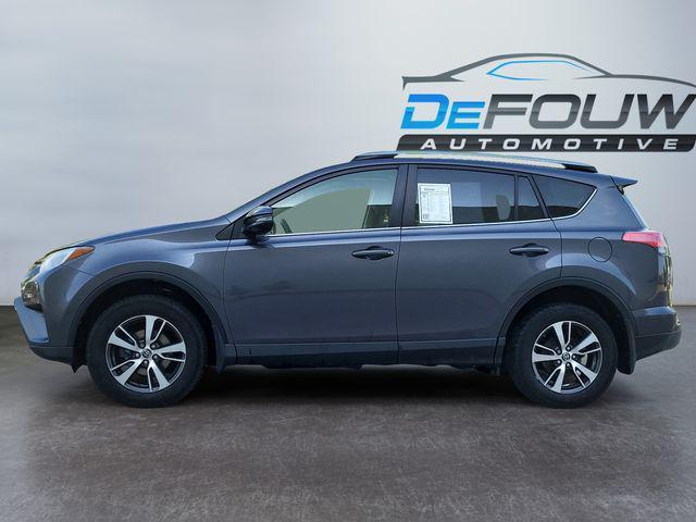 used 2018 Toyota RAV4 car, priced at $19,157