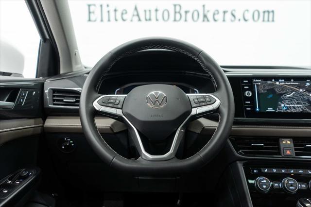 used 2023 Volkswagen Taos car, priced at $24,995