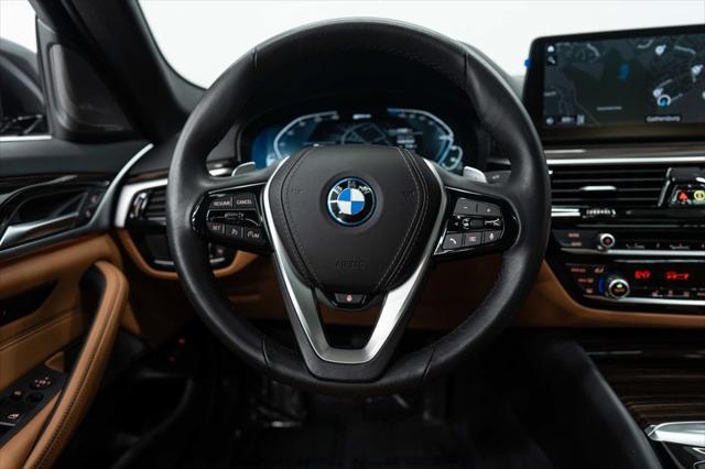 used 2023 BMW 530e car, priced at $37,895