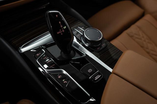 used 2023 BMW 530e car, priced at $37,895
