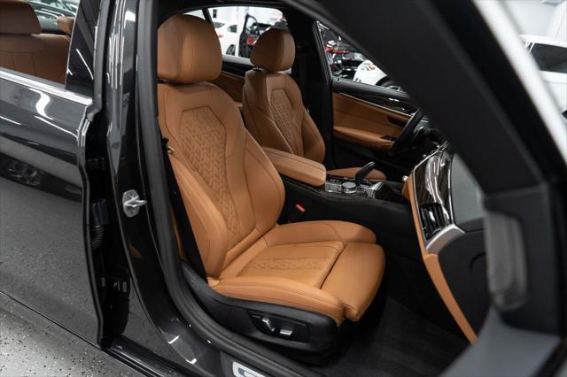 used 2023 BMW 530e car, priced at $37,895