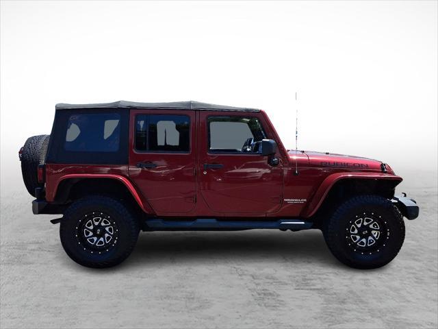 used 2012 Jeep Wrangler Unlimited car, priced at $15,598