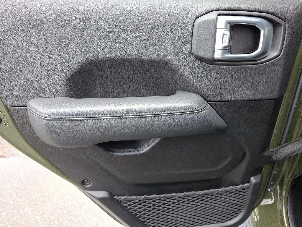 used 2023 Jeep Wrangler car, priced at $42,598