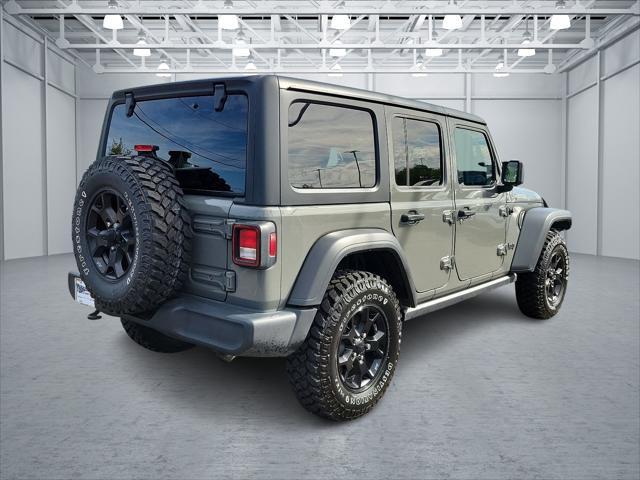 used 2021 Jeep Wrangler Unlimited car, priced at $36,598