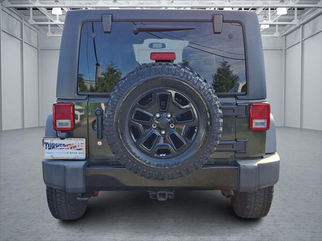 used 2016 Jeep Wrangler Unlimited car, priced at $22,598