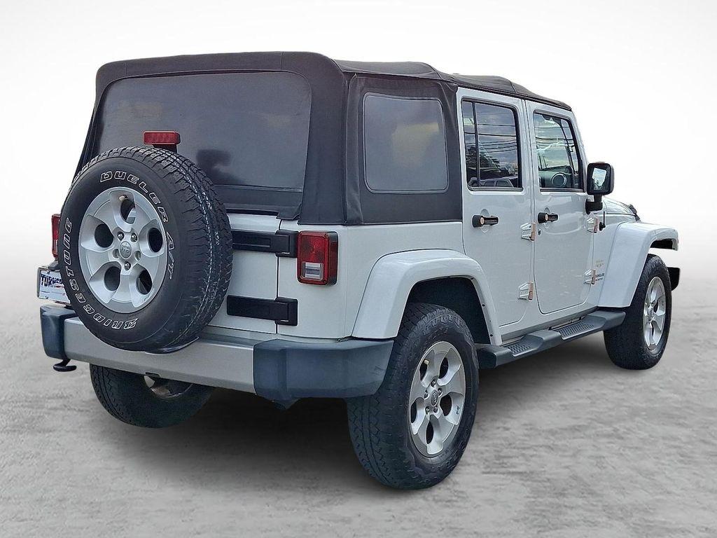 used 2013 Jeep Wrangler Unlimited car, priced at $14,598