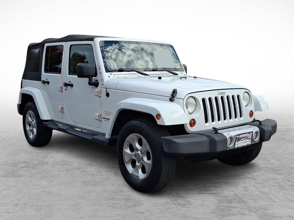 used 2013 Jeep Wrangler Unlimited car, priced at $14,598