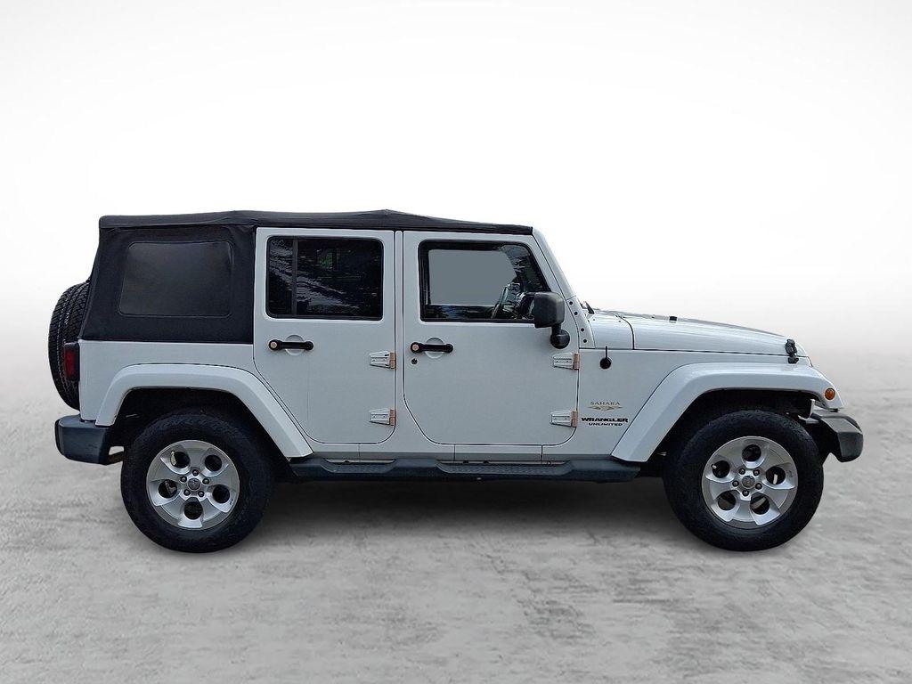 used 2013 Jeep Wrangler Unlimited car, priced at $14,598