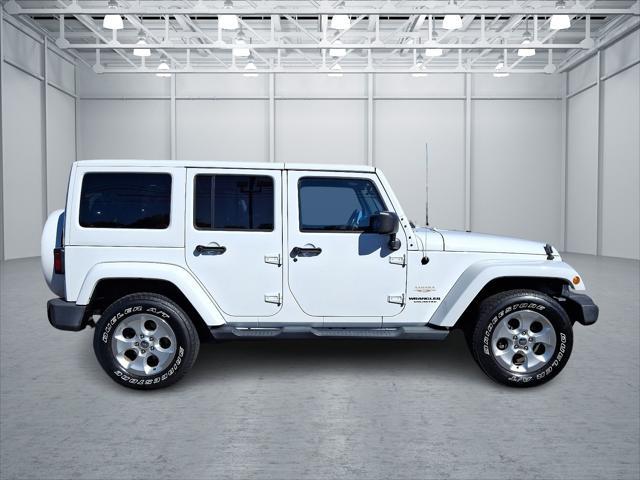 used 2014 Jeep Wrangler Unlimited car, priced at $20,598