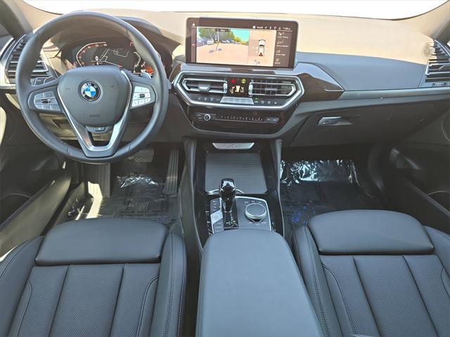 used 2024 BMW X4 car, priced at $40,477