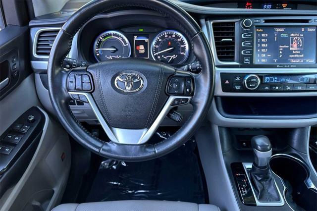 used 2019 Toyota Highlander Hybrid car, priced at $38,999