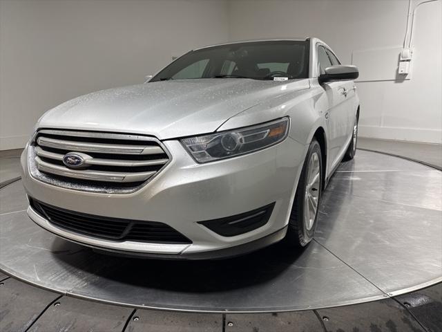 used 2015 Ford Taurus car, priced at $14,000