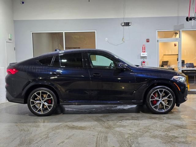 used 2022 BMW X6 car, priced at $59,555