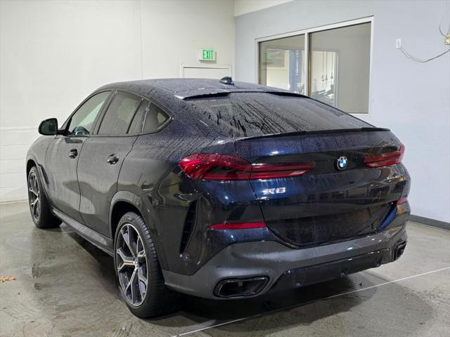 used 2022 BMW X6 car, priced at $59,555