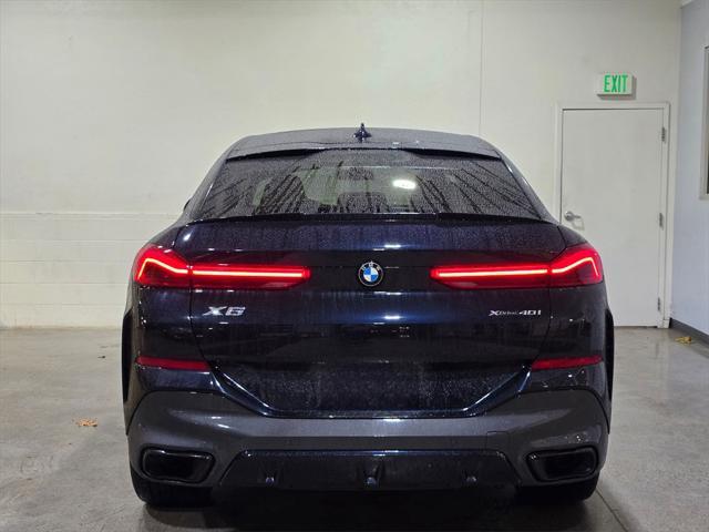 used 2022 BMW X6 car, priced at $59,555