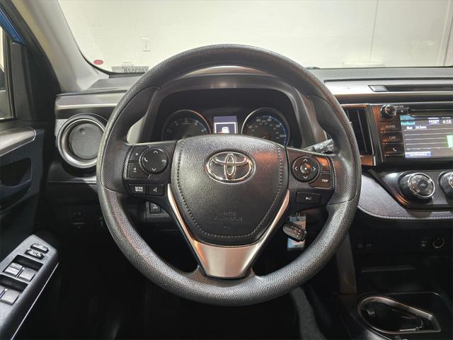 used 2018 Toyota RAV4 car, priced at $23,999