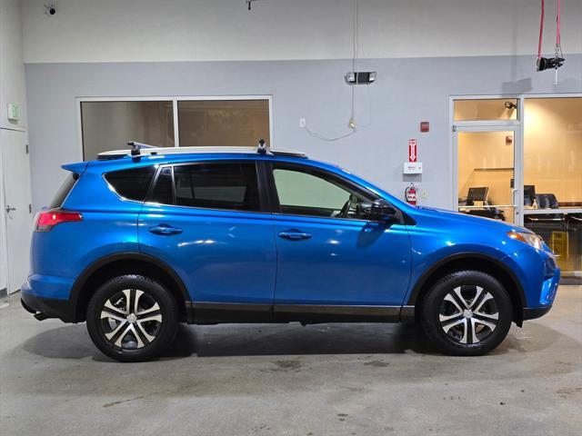 used 2018 Toyota RAV4 car, priced at $23,999