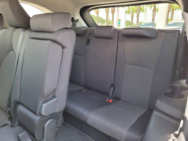 used 2025 Toyota Highlander car, priced at $40,499
