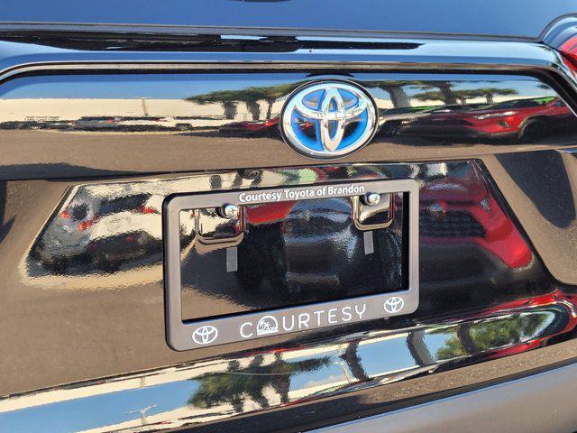 used 2021 Toyota RAV4 Hybrid car, priced at $30,000
