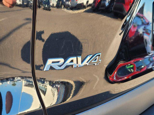 used 2021 Toyota RAV4 Hybrid car, priced at $30,000