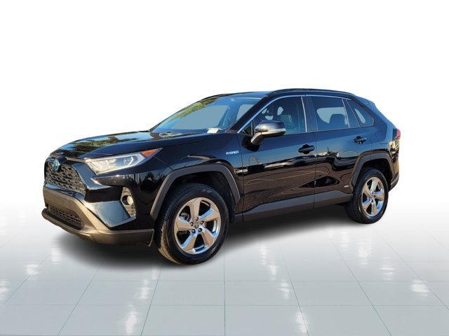 used 2021 Toyota RAV4 Hybrid car, priced at $30,000