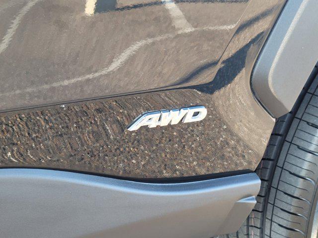 used 2021 Toyota RAV4 Hybrid car, priced at $30,000