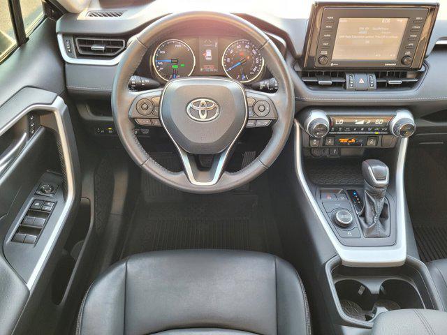 used 2021 Toyota RAV4 Hybrid car, priced at $30,000