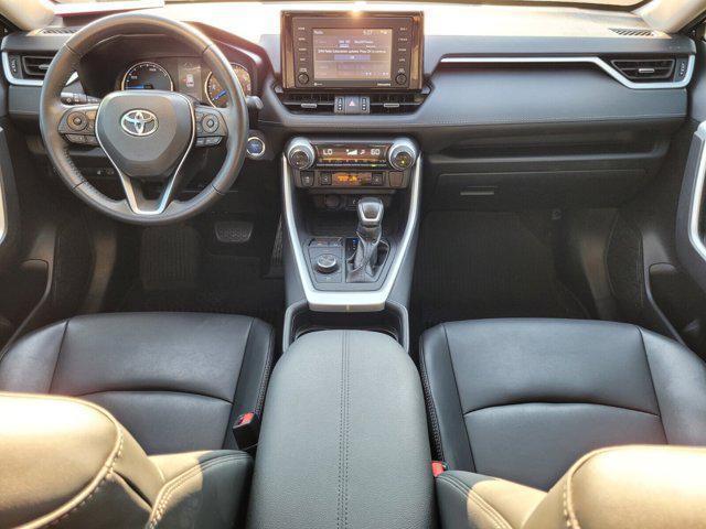 used 2021 Toyota RAV4 Hybrid car, priced at $30,000