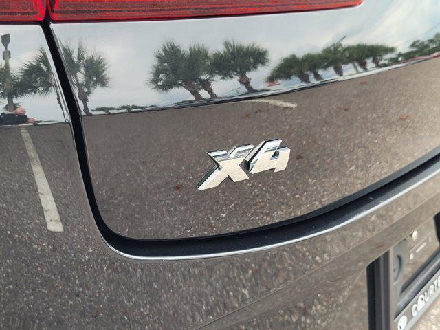 used 2024 BMW X4 car, priced at $62,657