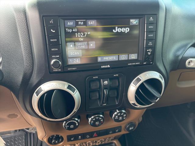 used 2013 Jeep Wrangler Unlimited car, priced at $15,995