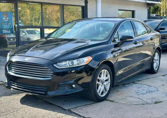 used 2016 Ford Fusion car, priced at $8,990