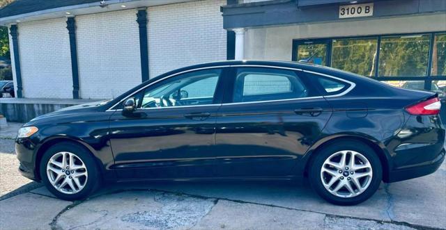 used 2016 Ford Fusion car, priced at $8,990