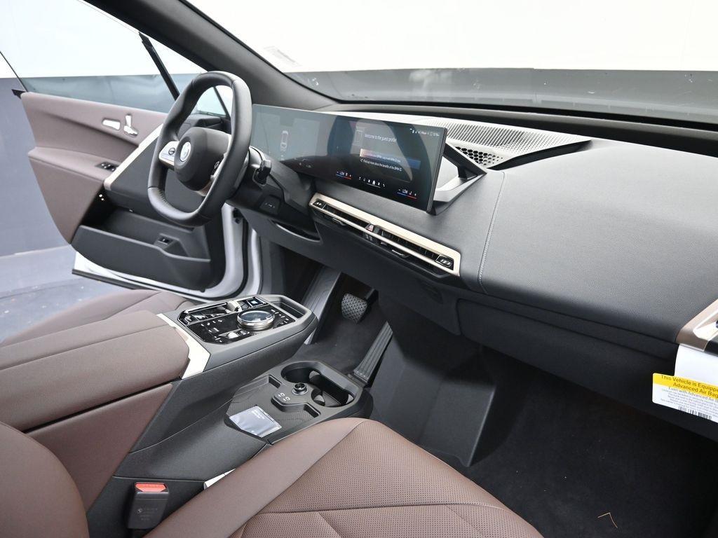new 2026 BMW iX car, priced at $83,695