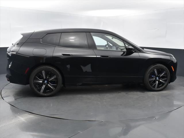 new 2024 BMW iX car, priced at $97,095